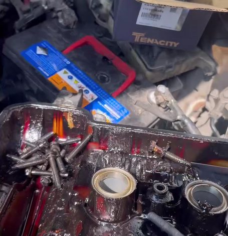 IS Auto Repairs mechanic diagnosing a Honda in Kingston